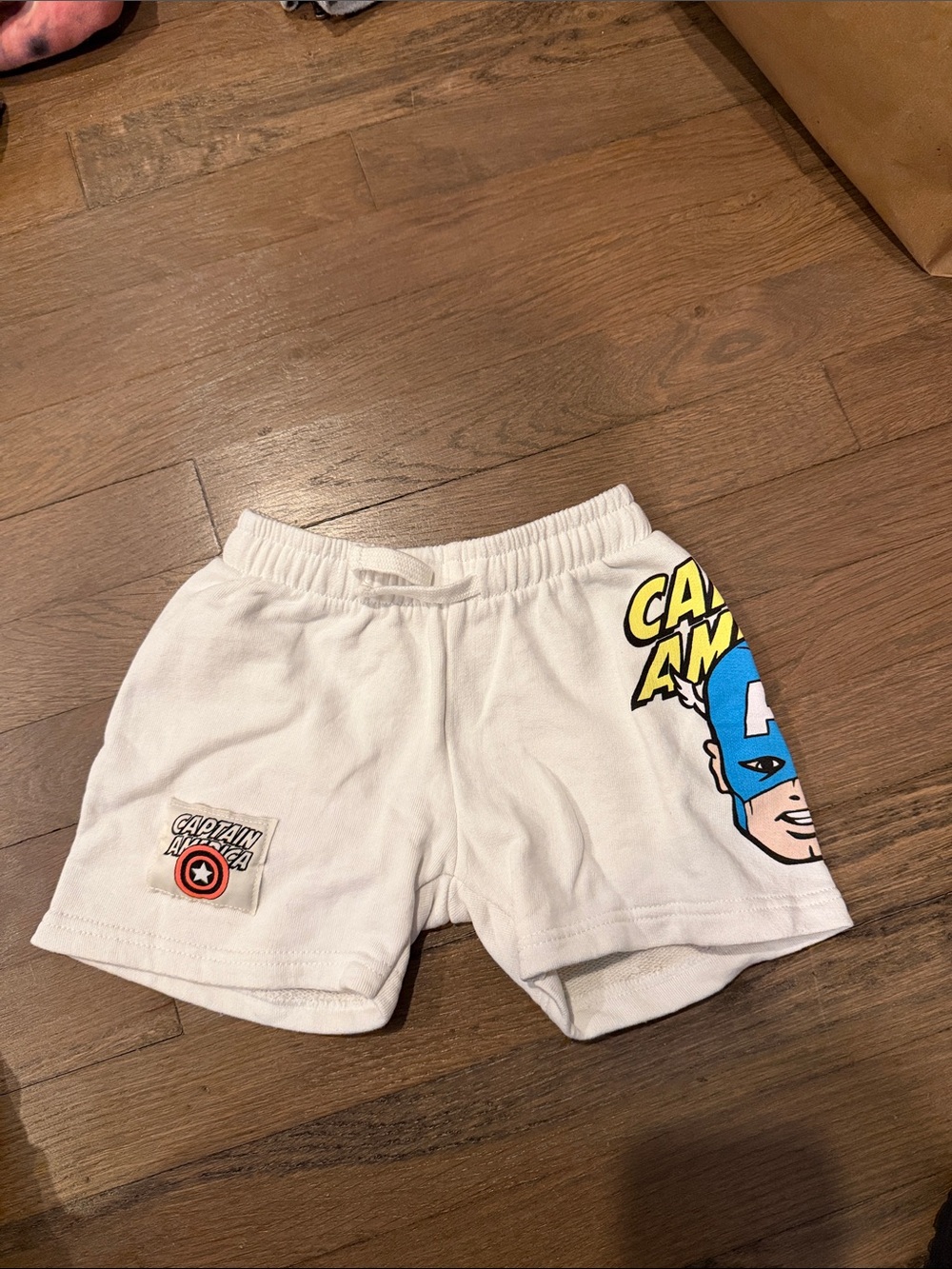 Zara White Kids Captain America Shorts with Blue and Yellow Graphic